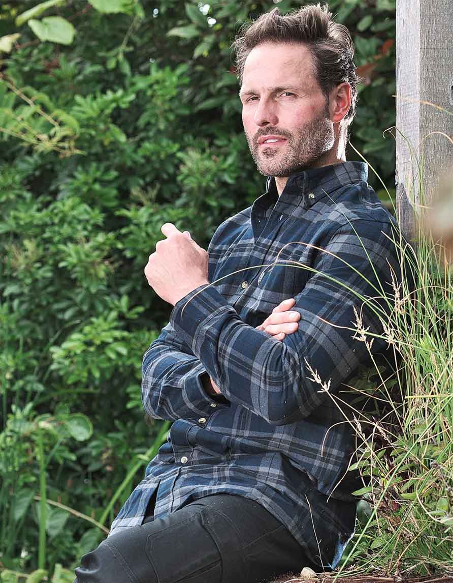 Navy Blue coloured Fort Hyde Shirt on green background