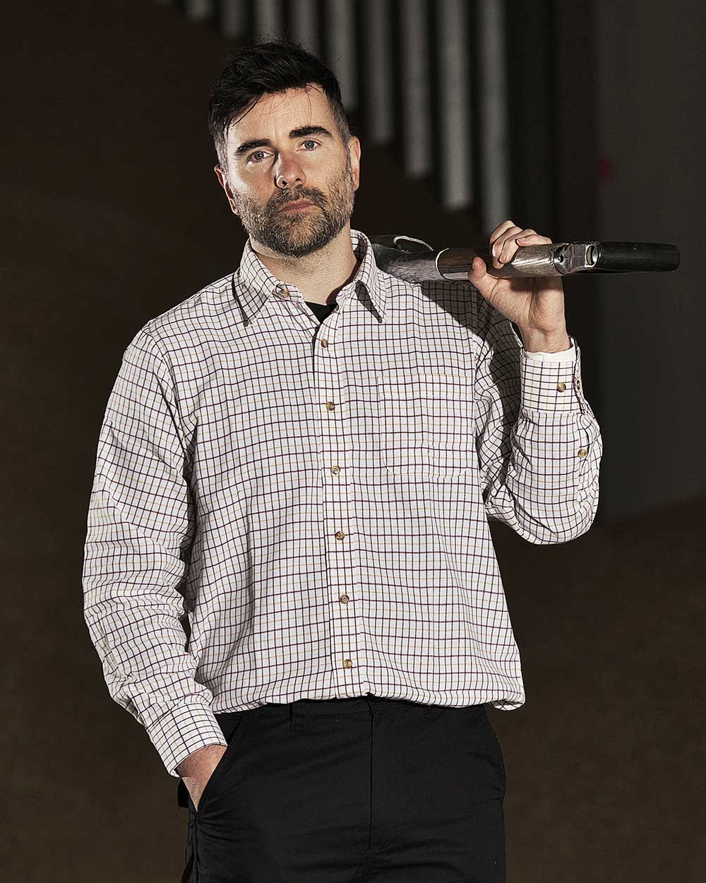 Green coloured Fort Tattersall Shirt on brown background