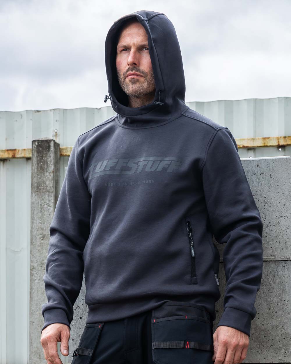 Grey coloured TuffStuff Hudson Hoodie on Warehouse Background
colour_grey