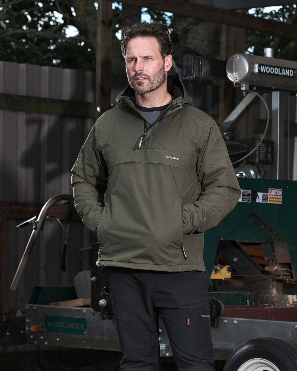 Green Coloured TuffStuff Sutherland Waterproof Windbreaker Smock On A Street Background