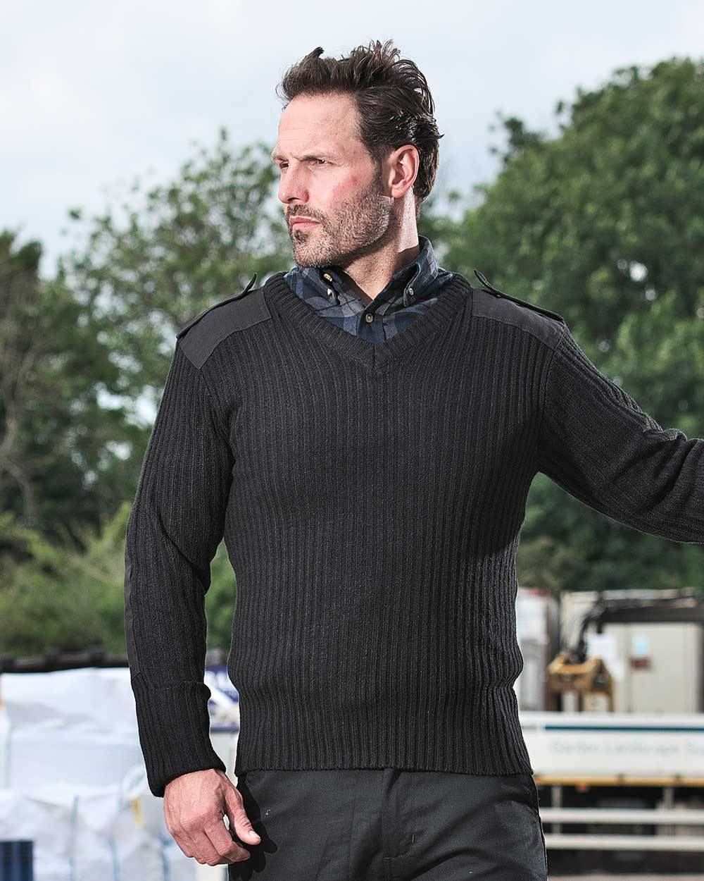 Black Coloured Fort V-Neck Combat Pullover On A Warehouse Background