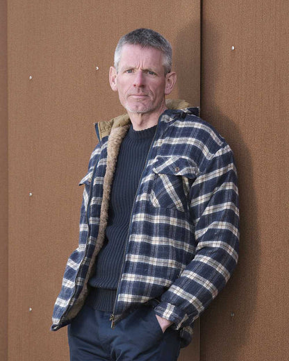 Blue coloured Fort Penarth Sherpa Fleece Lined Tartan Hoodie on brown background 