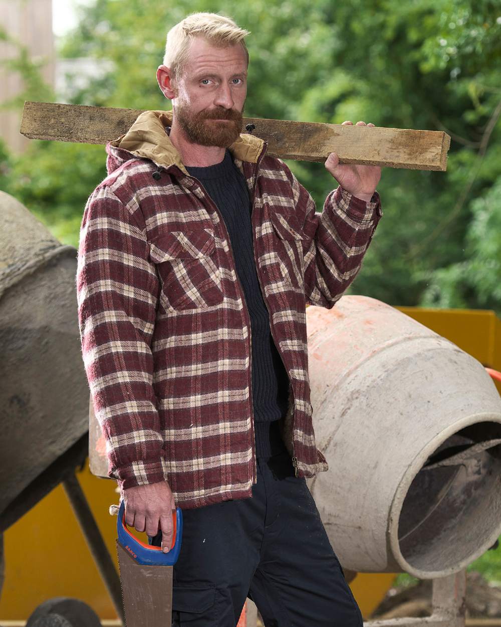 Red coloured Fort Penarth Sherpa Fleece Lined Tartan Hoodie on worksite background 