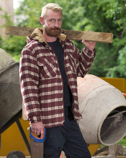 Red coloured Fort Penarth Sherpa Fleece Lined Tartan Hoodie on worksite background 