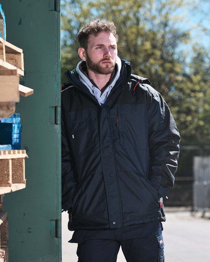 Navy Coloured TuffStuff Cleveland Jacket On A Backyard Background 