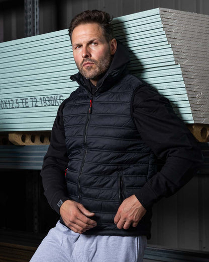 Black Coloured TuffStuff Elite Bodywarmer On A Factory Background
colour_black