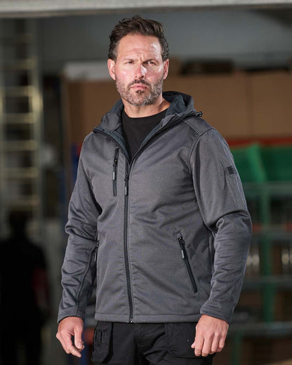 Grey Tuff Stuff Hale jacket in a warehouse background

