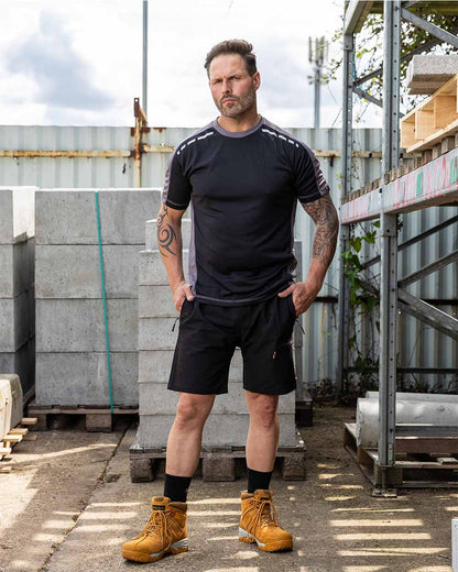 Black Coloured TuffStuff Hyperflex Shorts On A Warehouse Background