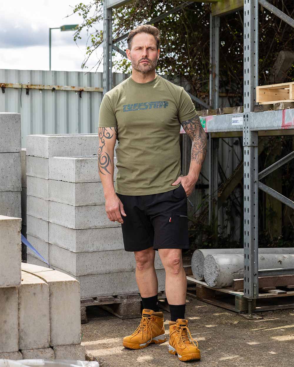 Black Coloured TuffStuff Hyperflex Shorts On A Warehouse Background