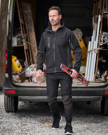 Black Coloured TuffStuff Hyperflex Trouser On A Street Background