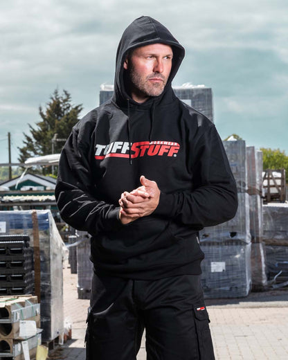 Black coloured TuffStuff Logo Hoodie on Warehouse background 
