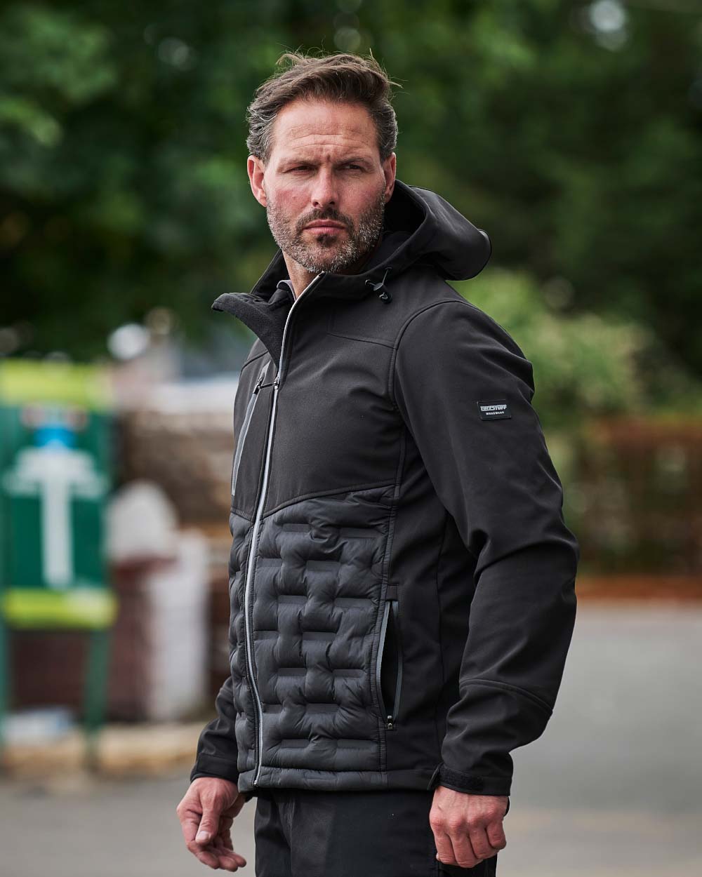 Black TuffStuff Stratford Softshell Jacket on Garden Background 