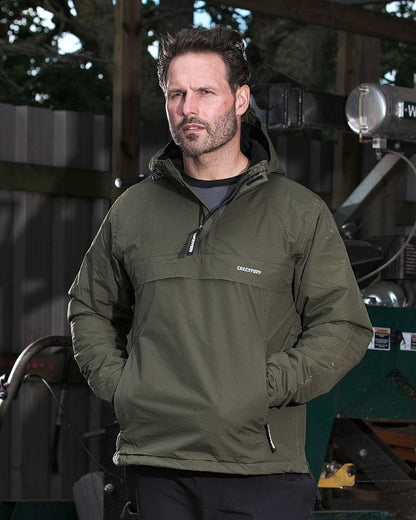 Green Coloured TuffStuff Sutherland Waterproof Windbreaker Smock On A Street Background 