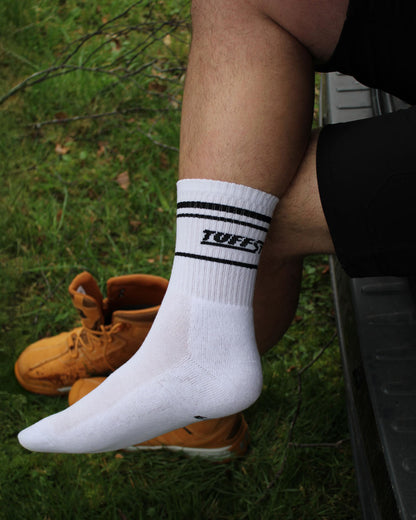 White TuffStuff Crew Socks on a grassy background